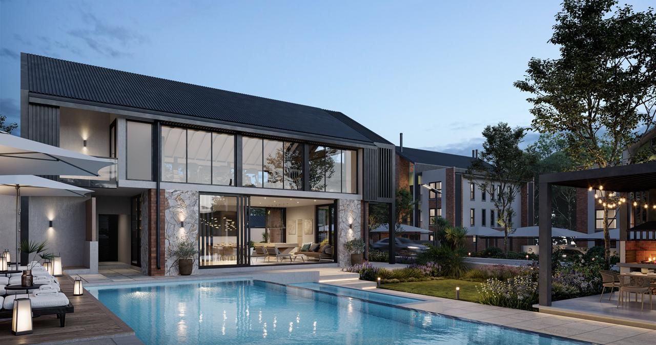 The pool and clubhouse at dusk